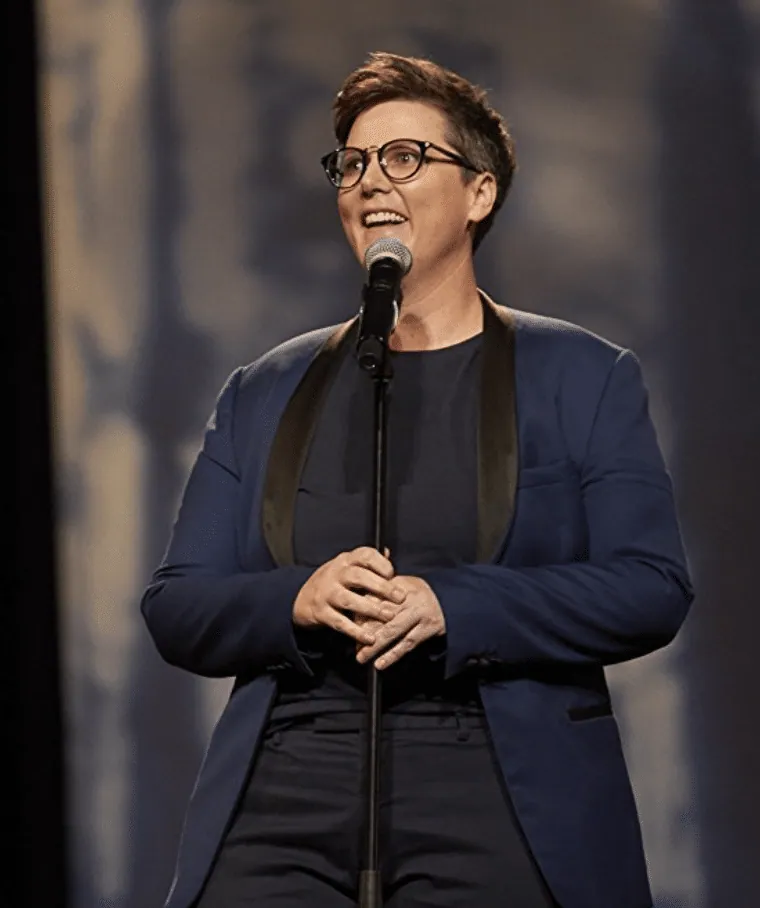 Hannah Gadsby performing stand-up on stage during Nanette.