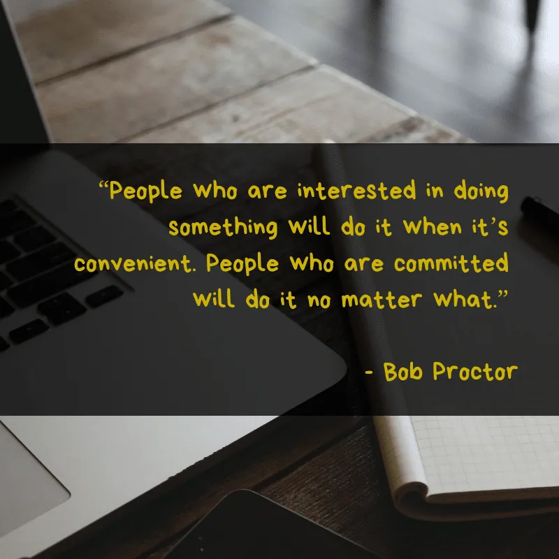 A laptop and notebook on a desk beside a quote: 'People who are interested in doing something will do it when it's convenient. People who are committed will do it no matter what.' — Bob Proctor