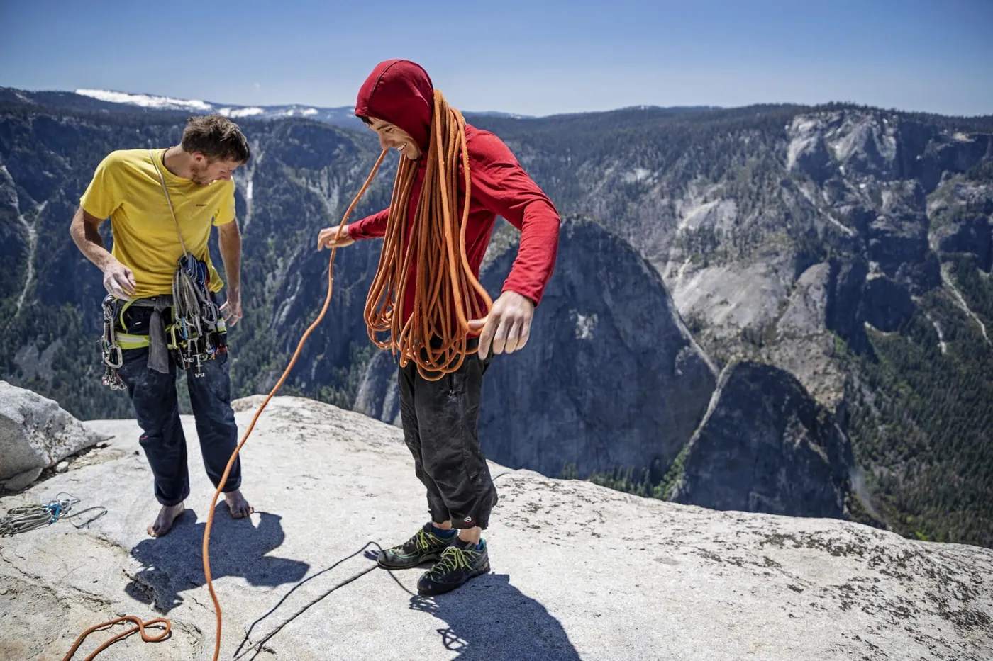 Alex Honnold and Tommy Caldwell organizing climbing gear atop El Capitan after setting a new speed record on Freerider. (National Geographic/Jimmy Chin)