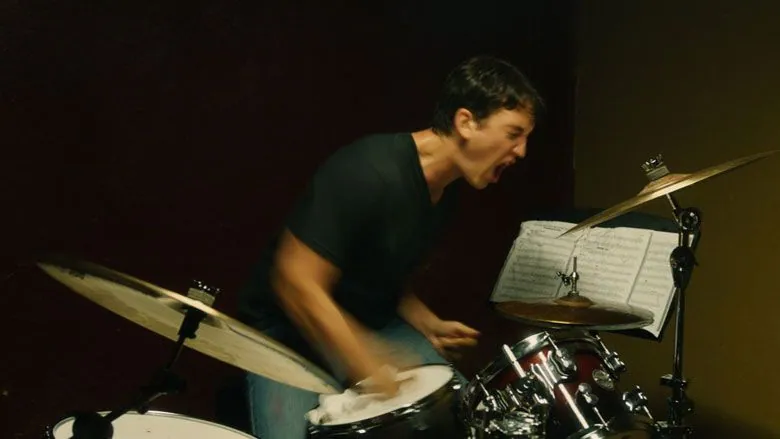Neiman drumming furiously and shouting mid-practice in Whiplash.
