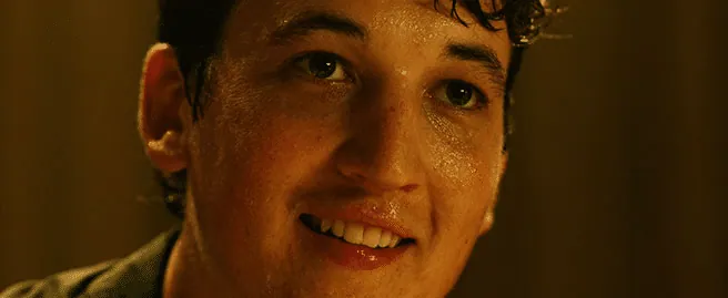 Neiman smiling, sweat-soaked, in the triumphant final moment of Whiplash.