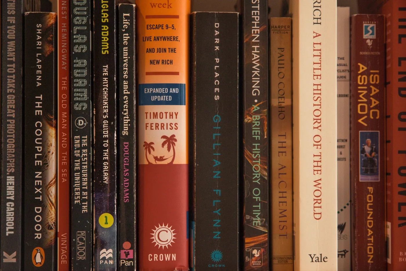 A shelf of book spines by many different authors, illustrating "masterwork studies teach; author comparisons destroy."