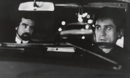 A passenger in the back seat of Travis's cab, seen in the rearview mirror as he tells Travis about killing his wife with a .44 Magnum.